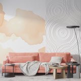 Peach watercolor mural bringing warmth to a minimalist bedroom setting