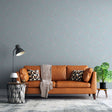 Modern abstract geometric wallpaper with pink patterns creating a calm atmosphere in a bright living room setting