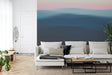 Abstract gradient wallpaper in modern living room creating serene atmosphere with sunset colors