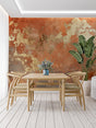 Abstract gold metallic wallpaper creating a warm ambiance in a modern living room with natural light