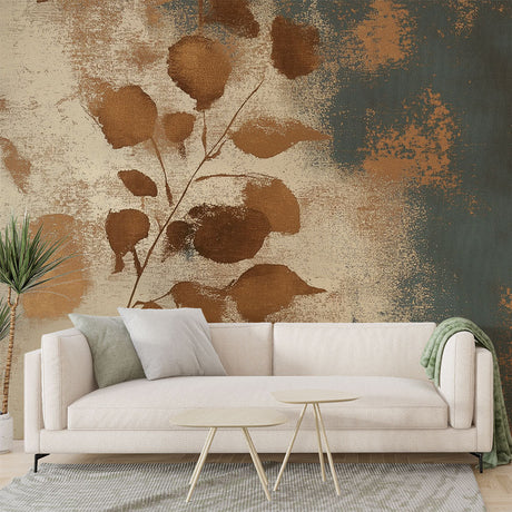 Terracotta and gold abstract leaf wallpaper creating a warm atmosphere in a modern living room with natural light