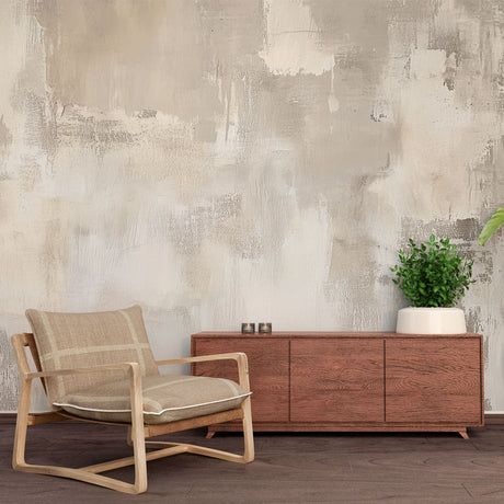 Abstract beige watercolor wallpaper creating a calm atmosphere in a modern living room with minimalist furniture