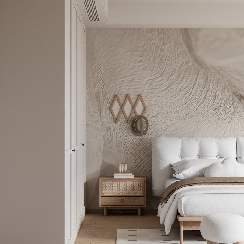 Bedroom with abstract wave wallpaper creating a calm, sophisticated atmosphere