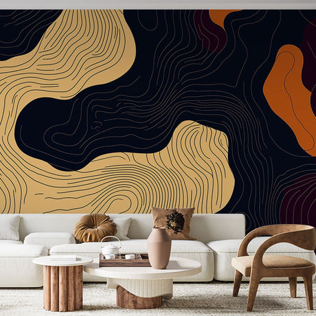 Abstract gold and black topographic wallpaper in a modern living room setting with minimal furniture and ambient lighting