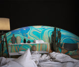 Abstract wave mural brings flow to master bedroom wall