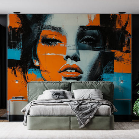 Modern abstract portrait wallpaper creating a bold statement in a minimalist living room with orange and blue accents