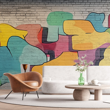 Street art abstract wallpaper displayed in a modern living room, showing vibrant shapes against white furniture