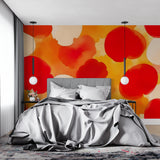 Red and orange geometric wallpaper brightening up a contemporary dining space