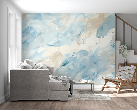 Abstract watercolor wallpaper in blue and beige tones creating a serene atmosphere in a modern living room