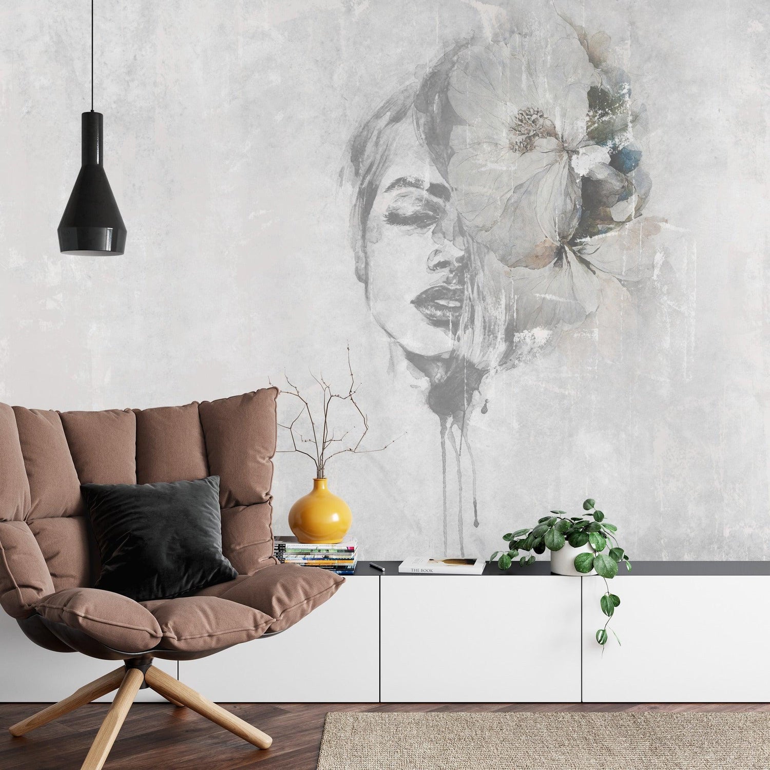 Watercolor portrait wallpaper creating a modern statement wall in a minimalist living room