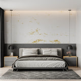 Abstract white and gold wallpaper creating elegant dining room atmosphere