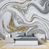 Marble and gold wallpaper in modern living room setting, creating an elegant backdrop for grey furniture