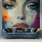 Abstract portrait wallpaper with blue eyes creating a dramatic focal point in a modern living room setting