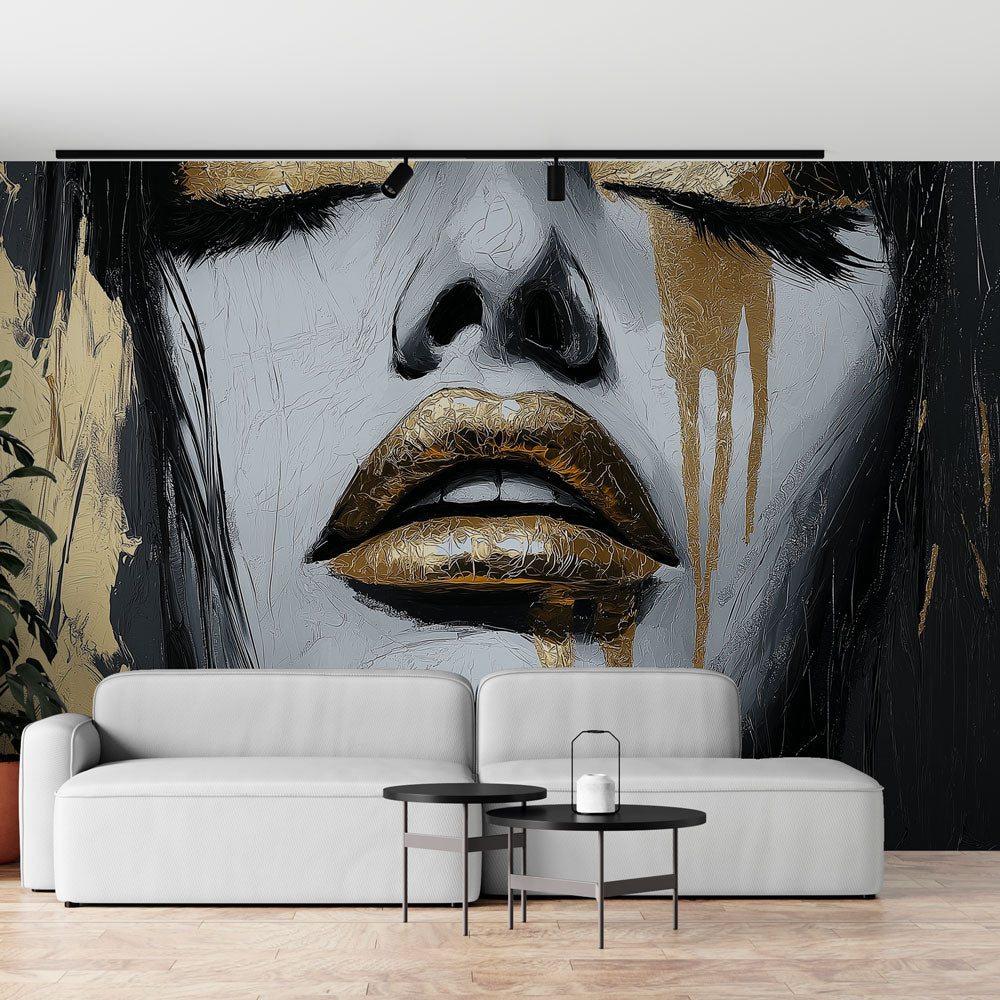 Abstract portrait wallpaper in gold and black creating drama in a modern living room with high ceilings