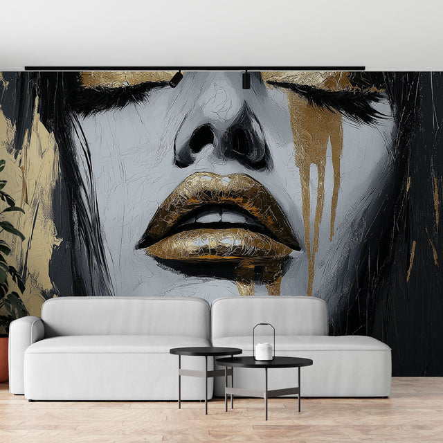 Abstract portrait wallpaper in gold and black creating drama in a modern living room with high ceilings