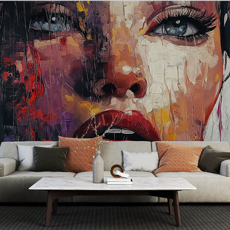 Abstract Portrait Mural Wallpaper creating drama in a modern living room with minimalist furniture and mood lighting