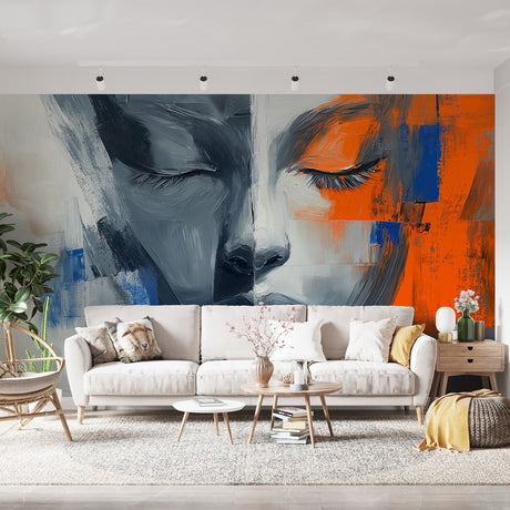 Abstract portrait wallpaper creating dramatic impact in a modern living room with grey sofa and orange accents