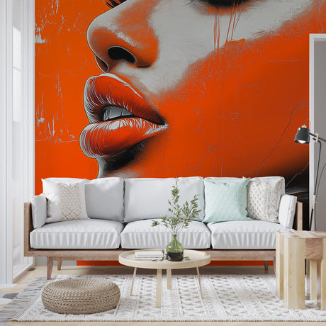 Street art portrait wallpaper creating modern impact in a bright living room with orange accents and minimalist furniture