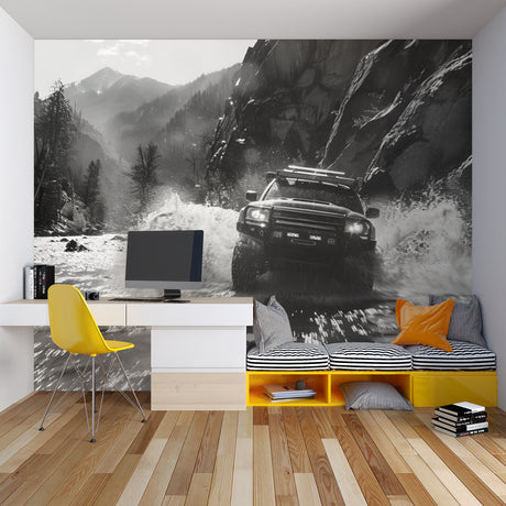 Black and white rally car wallpaper creating drama in a modern living room with high ceilings