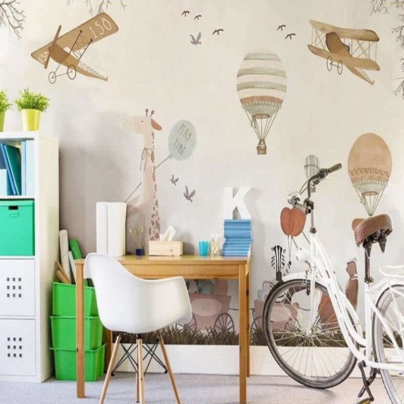Kids playroom featuring safari adventure wallpaper with flying animals and vintage airplanes