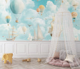 Maritime and sky adventure mural in child's reading nook showing scale and detail