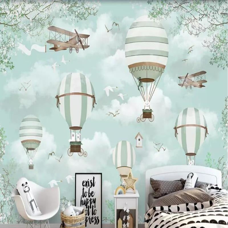 Vintage airplane wallpaper bringing charm to a child's playroom with mint green accents