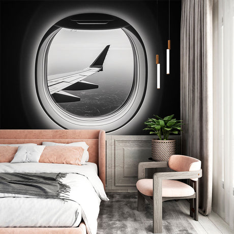 Airplane window view wallpaper in modern minimalist home office, creating depth and architectural interest