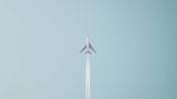 Minimalist airplane wallpaper design file showing clean lines and powder-blue sky pattern