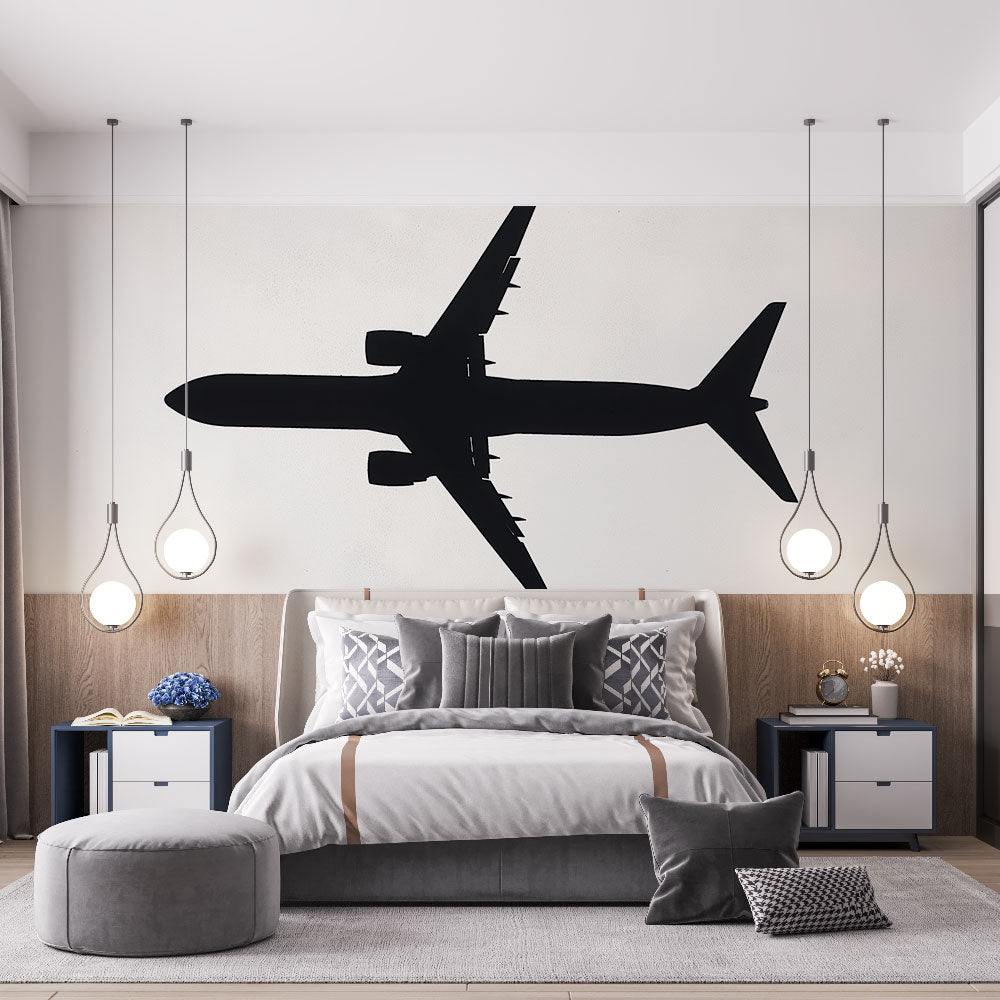 Modern Airplane Wallpaper in a minimalist home office showing black aircraft silhouette against white wall