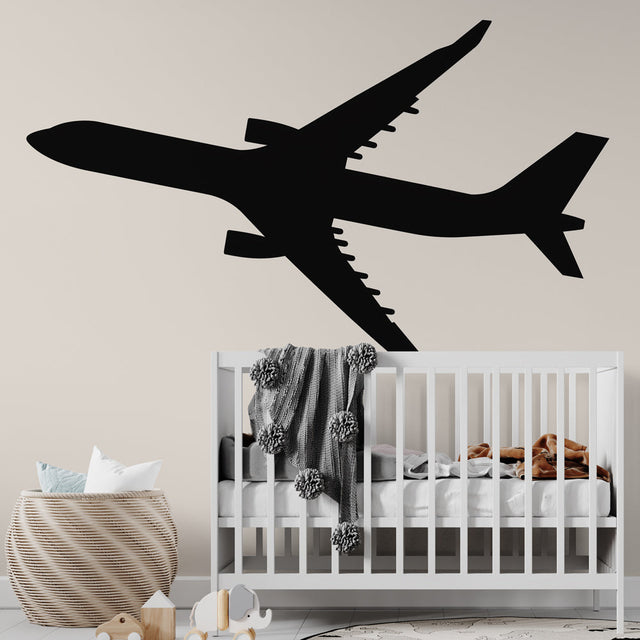 Modern Airplane Wallpaper displayed in a bright kids bedroom, showing black aircraft silhouette against beige background