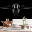 Modern airplane line art wallpaper displayed in a sleek home office, showing clean black and white technical drawing style