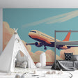 Airplane wallpaper mural in modern kids bedroom, showing retro aviation design against peaceful sunset colors