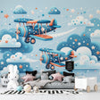 Airplane mural wallpaper bringing adventure to a modern kids bedroom, with vintage-style planes and stars creating a magical atmosphere