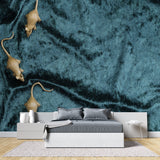 Teal and gold mice wallpaper making a bold statement in dining room setting