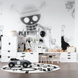 Black and white anime wallpaper in modern teen bedroom showing dynamic manga characters