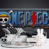 Japanese anime wall mural in a teen bedroom showing the iconic One Piece logo