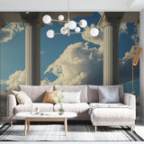Greek column wallpaper mural creating depth in a modern living room with high ceilings and minimal furniture