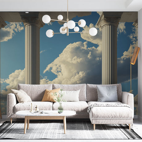 Greek column wallpaper mural creating depth in a modern living room with high ceilings and minimal furniture