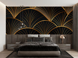 Art deco black and gold fan pattern wallpaper in modern dining room with crystal chandelier