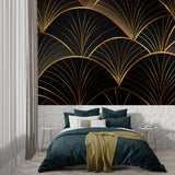 Black and gold geometric wallpaper creating drama in master bedroom