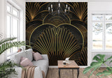 Geometric art deco wallpaper adding drama to dining room with crystal chandelier