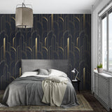 Black and gold Art Deco wallpaper in modern dining room with crystal chandelier