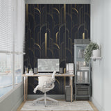Art Deco black and gold wallpaper in hotel lobby setting