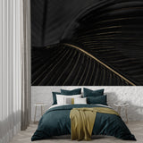Black and gold art deco wallpaper making a bold statement in master bedroom