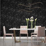 Baroque pattern wallpaper adding sophistication to a home office space