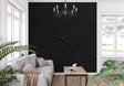 Black Art Deco wallpaper with circular pattern in modern living room setting