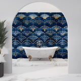 Blue and gold geometric art deco wallpaper making statement in dining room