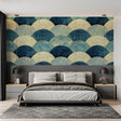 Japanese wave art deco wallpaper in modern living room with blue sofa and gold accents