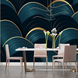 Modern home office featuring geometric teal wallpaper with gold accents