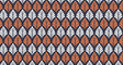 Art deco fan pattern wallpaper in orange and white creating a stunning focal point in a modern dining room